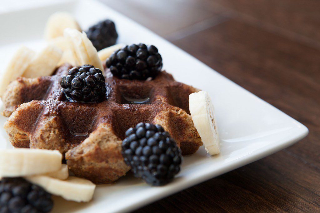 Paleo Almond Flour Waffles with Maple Syrup and Berries