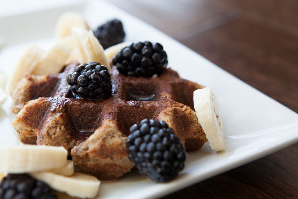 Paleo Almond Flour Waffles with Maple Syrup and Berries
