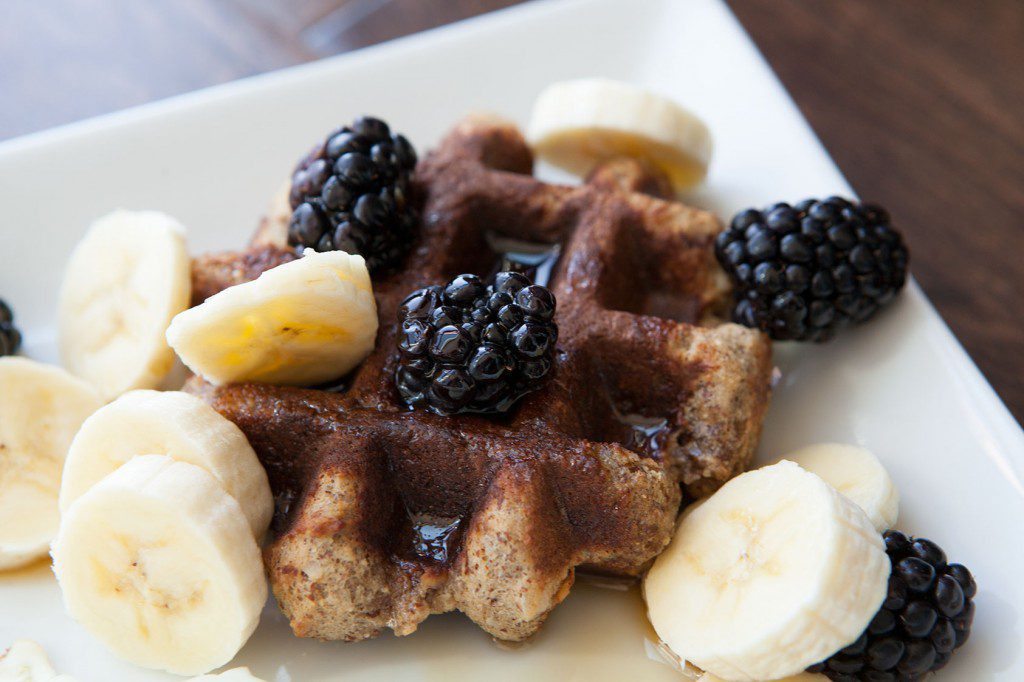 Paleo Almond Flour Waffles with Maple Syrup and Berries