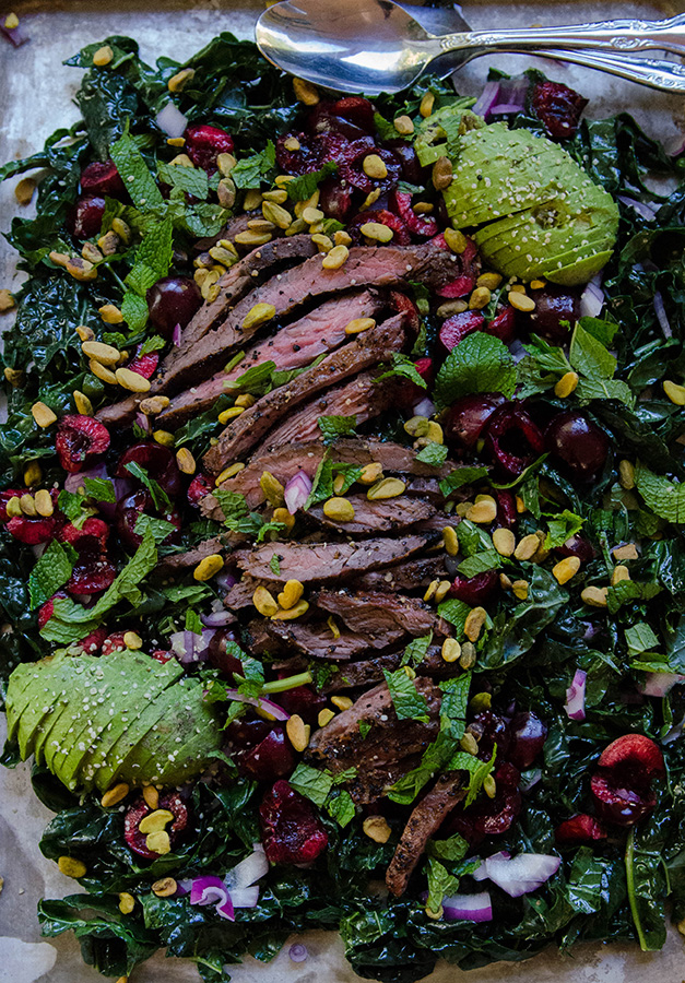 Massaged Kale Salad with Cherries, Pistachios & Grilled Flank Steak