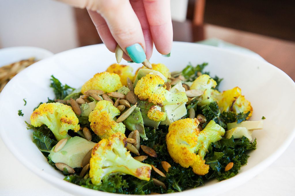 Turmeric Cauliflower Kale Salad with Roasted Pepitas