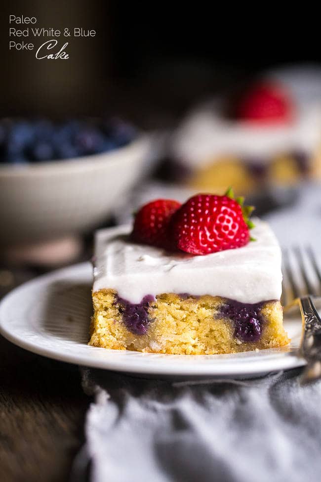 PALEO POKE CAKE WITH BLUEBERRIES, STRAWBERRIES AND COCONUT CREAM